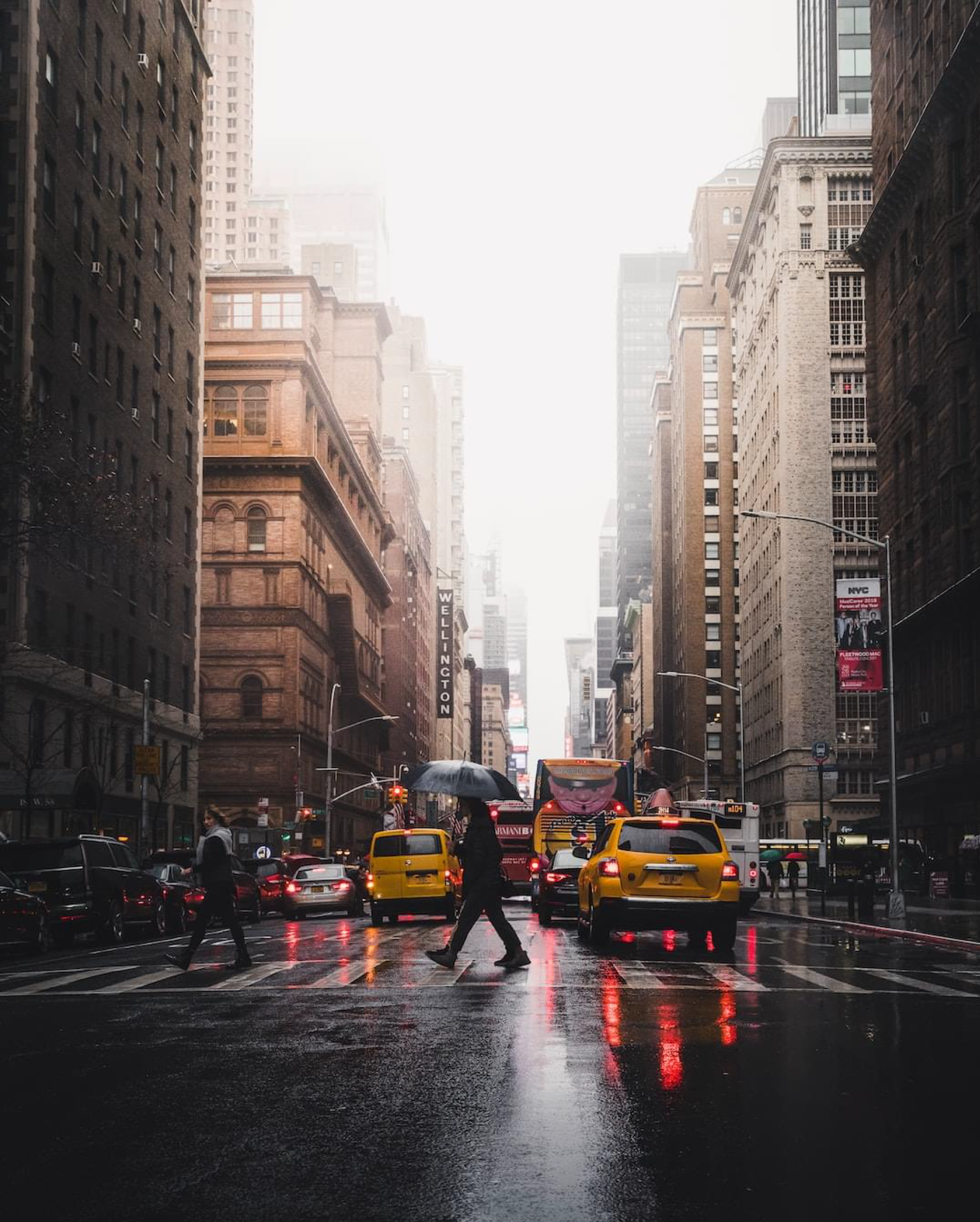 Photo of a foggy New York City street in the rain